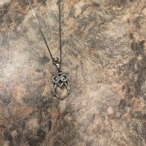 1/10 CT. T.W. Diamond Owl Pendant in 10K White Gold